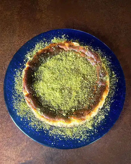 Chocolate Pistachio Cheesecake in blue plate