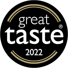 Black circular Great Taste 2022 award badge for Oatopia's flapjacks
