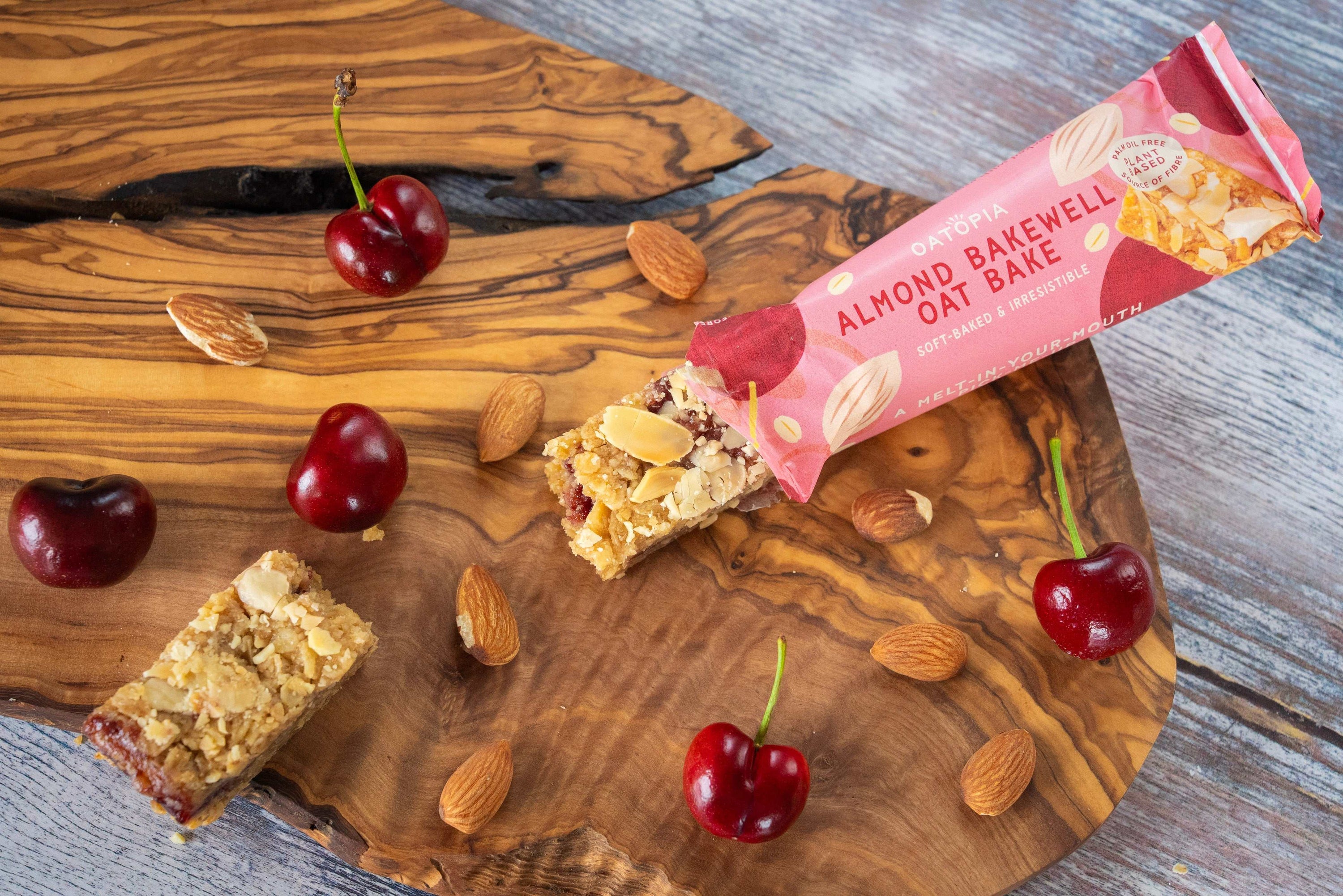 Soft baked oat bars with ground almonds and a layer of morello cherry jam, inspired by the classic Bakewell.