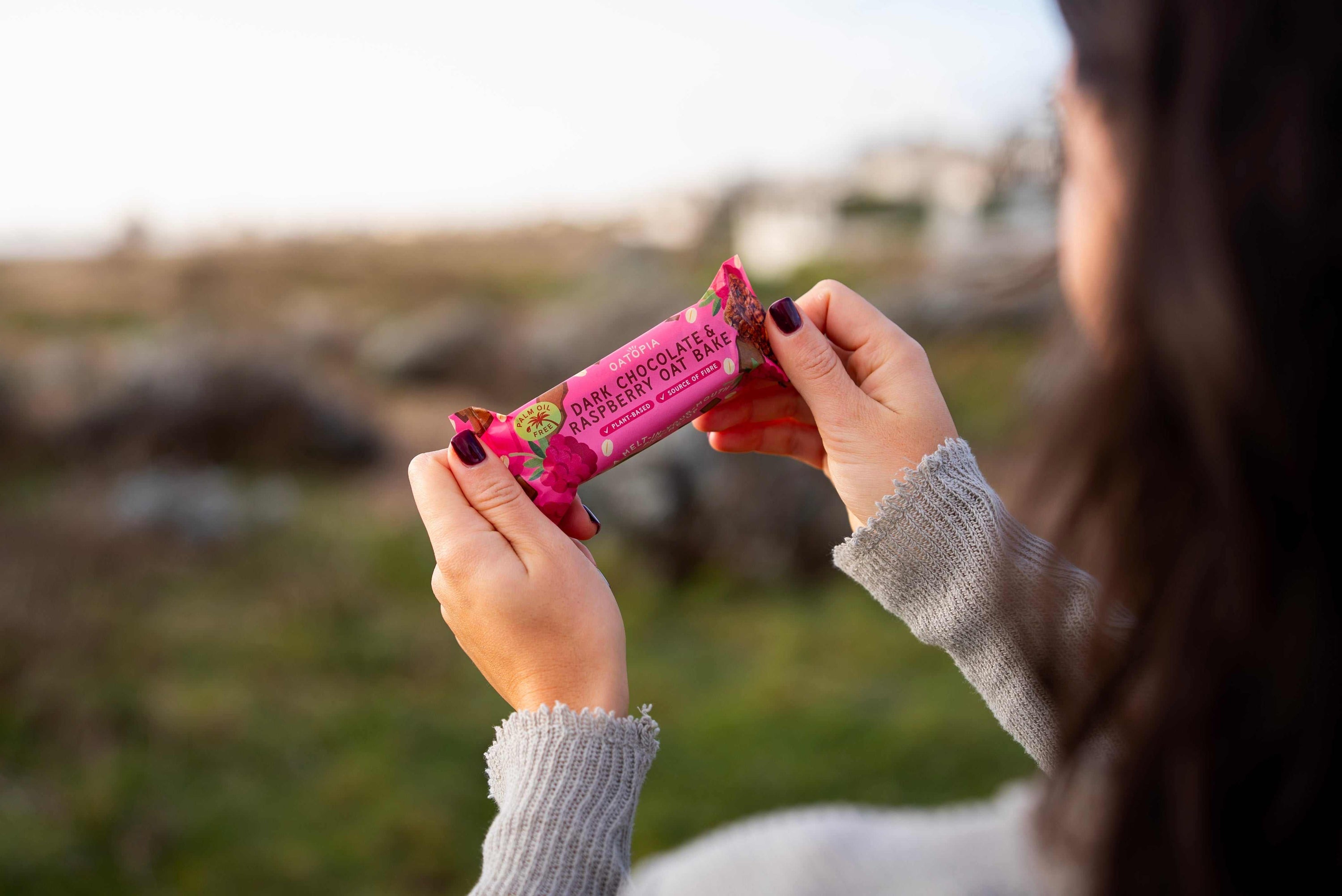 Dark Chocolate and Raspberry Oat Bake bar with wholegrain oats and plant-based ingredients