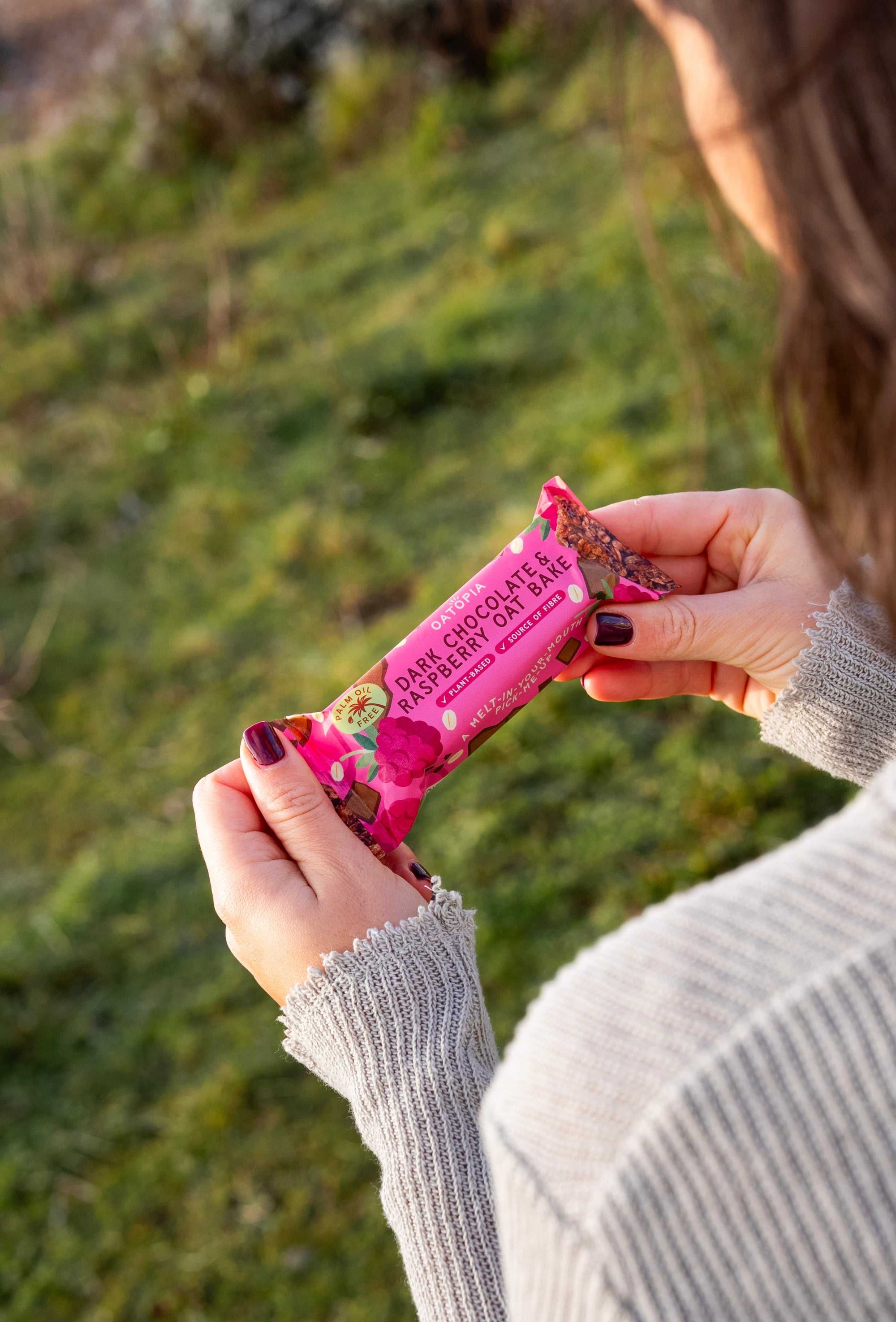 Box of Dark Chocolate and Raspberry Vegan Oat Bake bars with wholegrain oats and raspberries