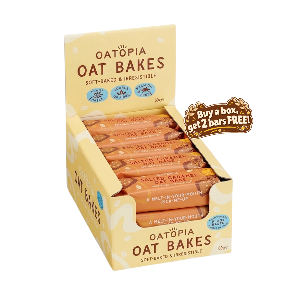 Oatòpia Oat Bakes salted caramel oat bar display box with individual wrapped bars visible inside, plus a brown promotional sticker that says 'Buy a box, get 2 bars FREE!'.