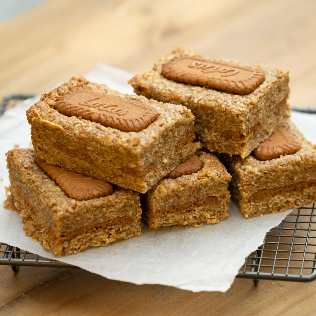5 pieces of biscoff flapjacks stack placed on iron grill